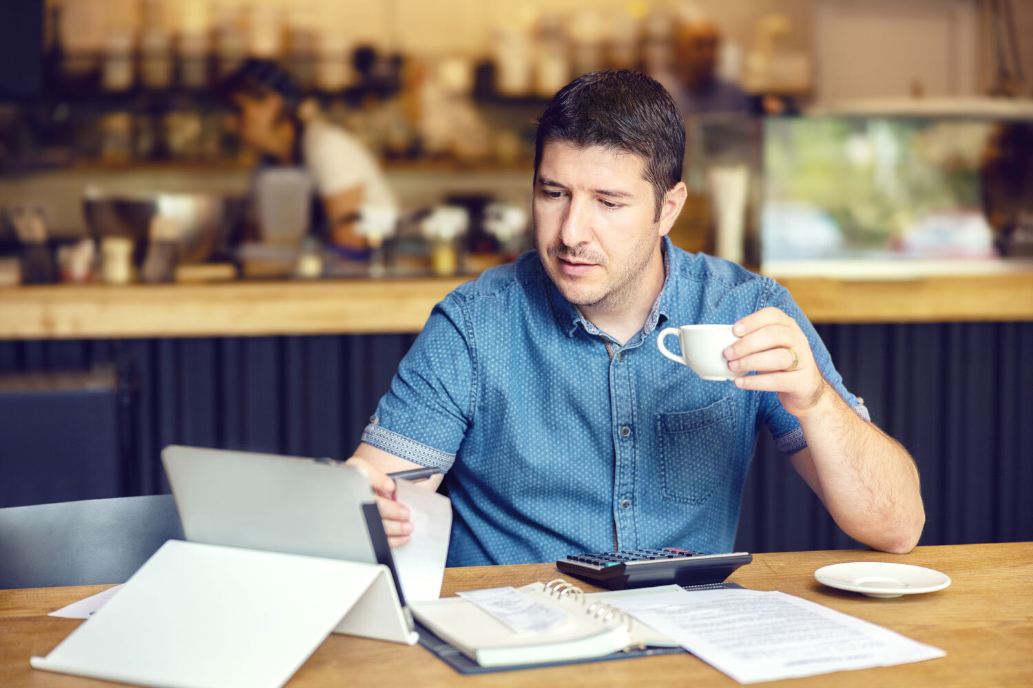man-coffee-shop-working.jpg