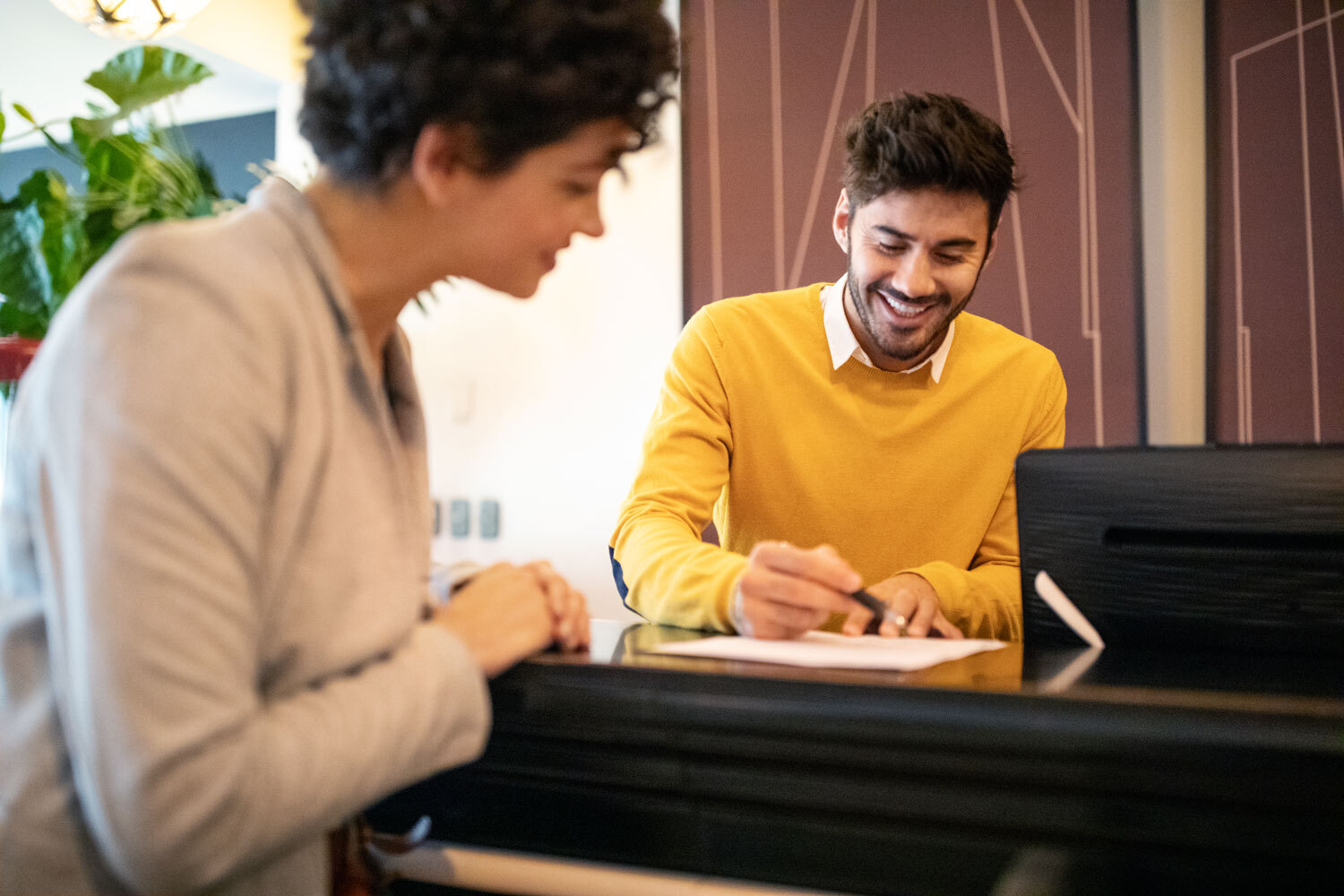 signature-customer-staff-smiling.jpg